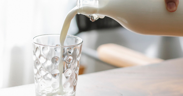 This image shows milk being poured to a glass